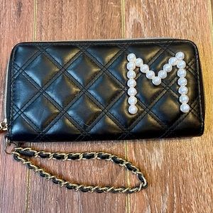 Black monogram ‘M’ quilted wallet